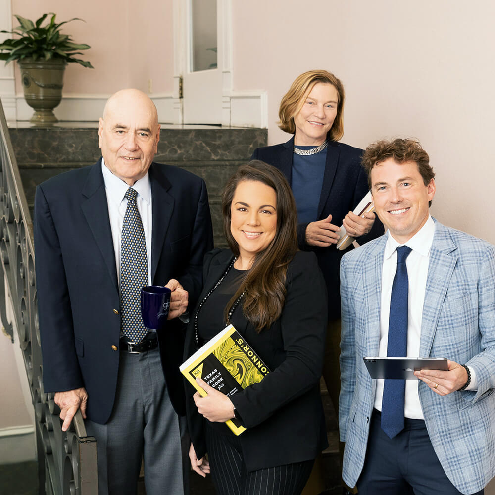 Gray Becker attorneys at the base of stairs